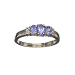 0.70CT Oval Cut Tanzanite And White Sapphire Sterling Silver Ring